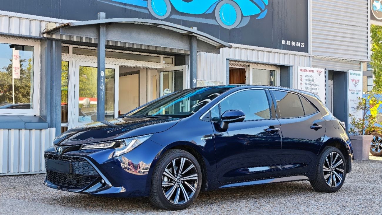 Mandataire TOYOTA COROLLA HYBRIDE MY20 122h Design TOIT OUVRANT 1ERE MAIN