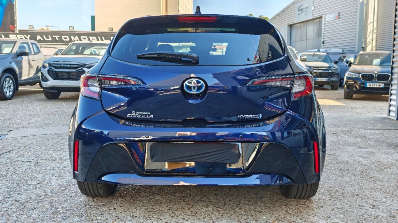 Mandataire TOYOTA COROLLA HYBRIDE MY20 122h Design TOIT OUVRANT 1ERE MAIN